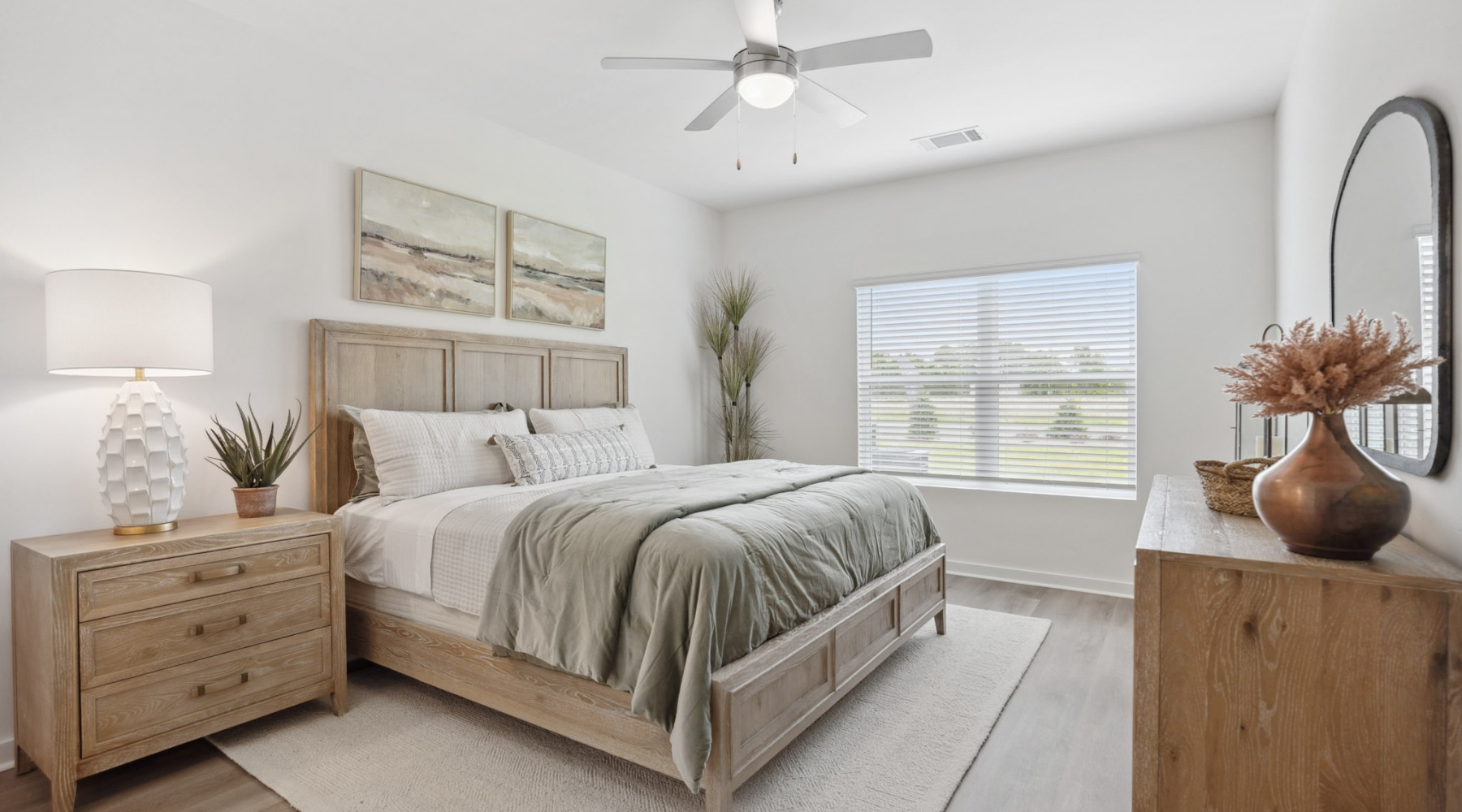 Spacious bedrooms with everything you need bedroom with lamps and a large window