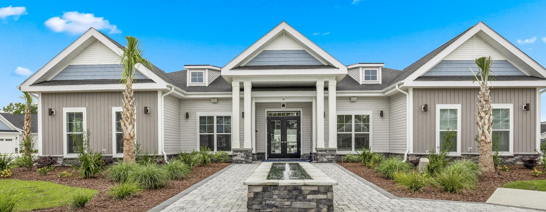 a house with a brick driveway