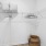 closet with shelves and a basket on the floor
